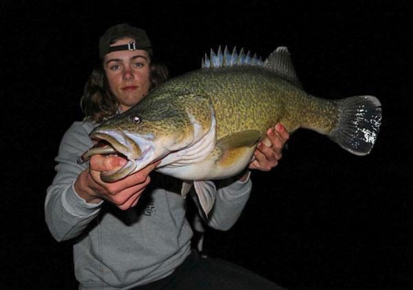 Young man with a murray cod